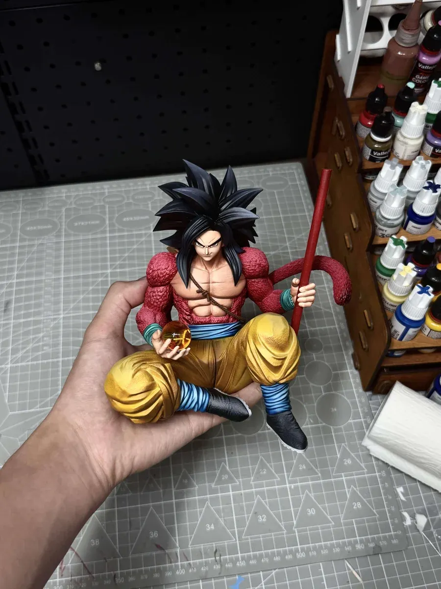 "Limited edition 1/6 Super Saiyan 4 Goku Dragon Ball GT statue by Ranyao Studio. View its dynamic pose and intricate details from multiple angles."