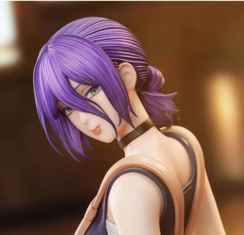 Close-up of the Chainsaw Man Reze figure by QuietArt Studio, highlighting the purple hair colorway, green eyes, and cafe waitress sculpt detail.