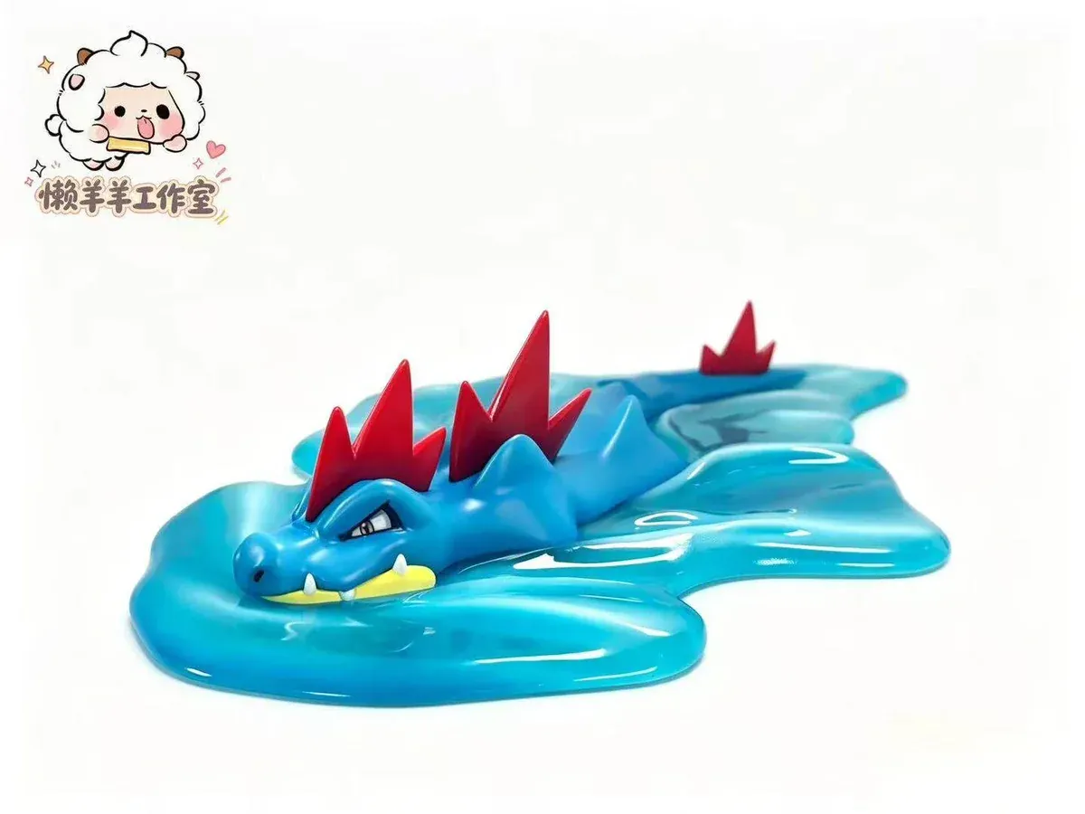 "Feraligatr figure detailed sculpture, showing fierce expression and dynamic water-type diorama with crashing waves. A premium Pokemon statue."