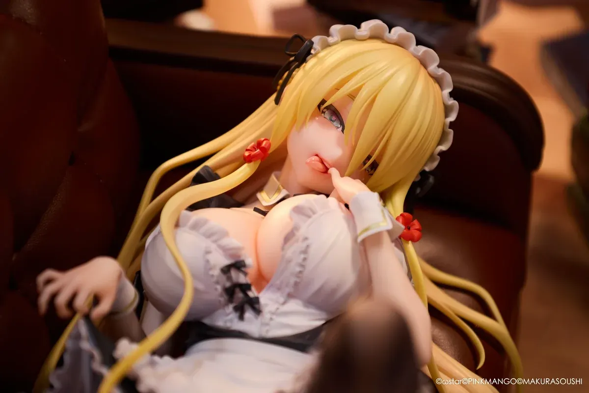 "Exquisite Ariko Bishoujo Mangakyo statue from Pinkmango Studio. Elegant pose on a sofa, highlighting alluring design and intricate sculpt details."