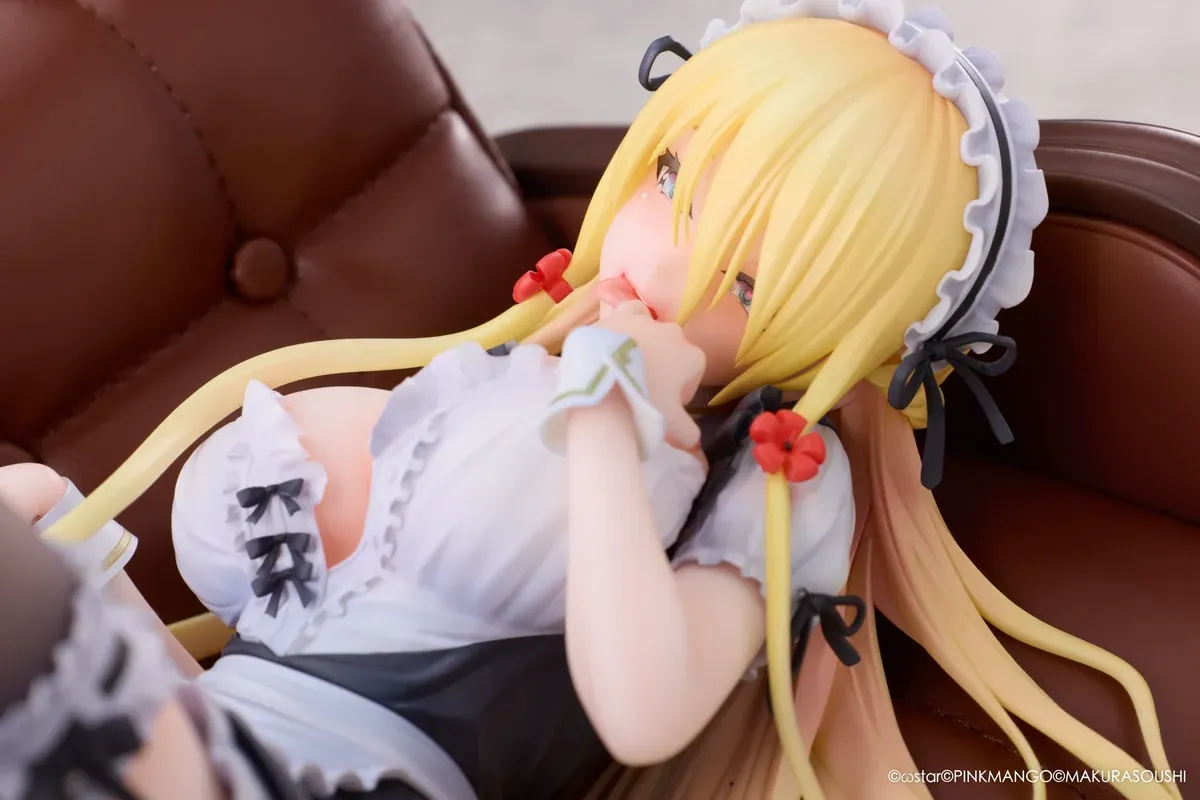 "Exquisite Ariko Bishoujo Mangakyo statue from Pinkmango Studio. Elegant pose on a sofa, highlighting alluring design and intricate sculpt details."