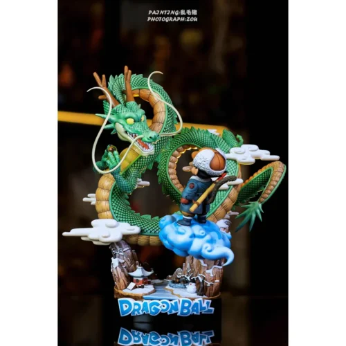 "Exclusive Desk Notes Studio Dragon Ball statue of Kid Goku summoning majestic Shenron in a whimsical winter diorama, a limited edition collectible."