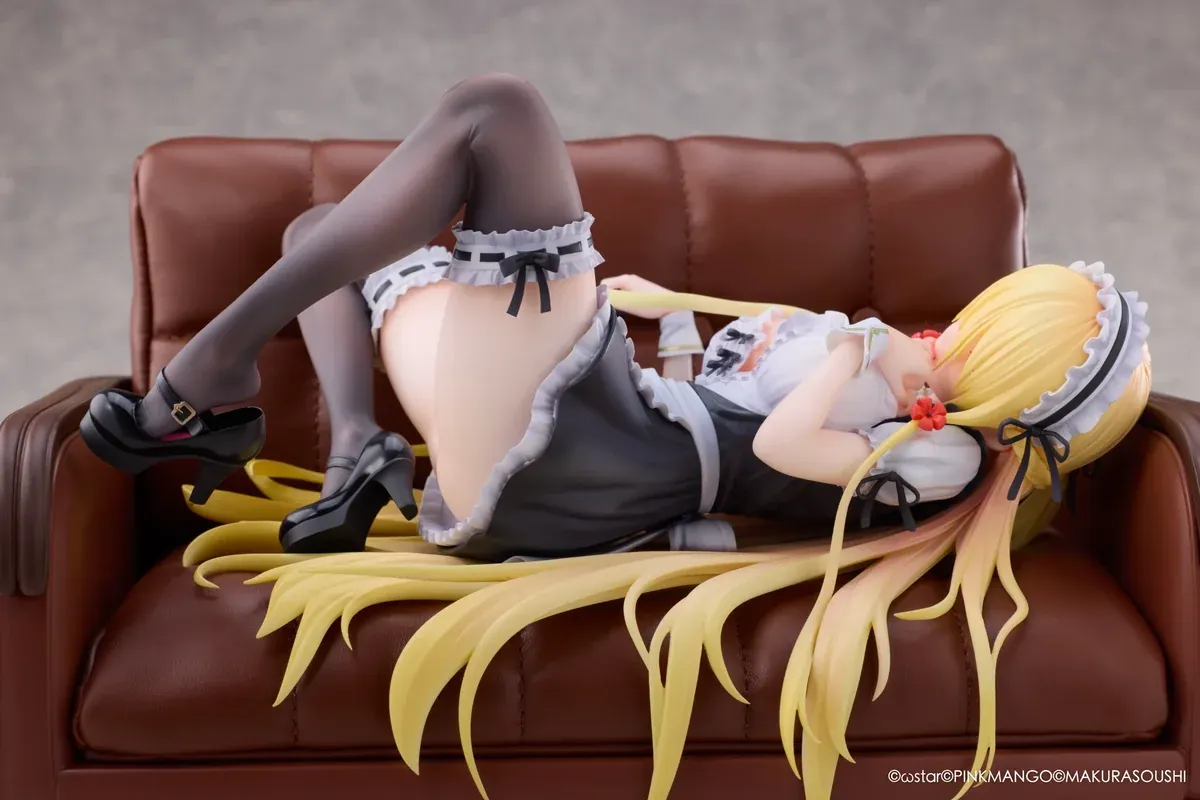 "Exquisite Ariko Bishoujo Mangakyo statue from Pinkmango Studio. Elegant pose on a sofa, highlighting alluring design and intricate sculpt details."