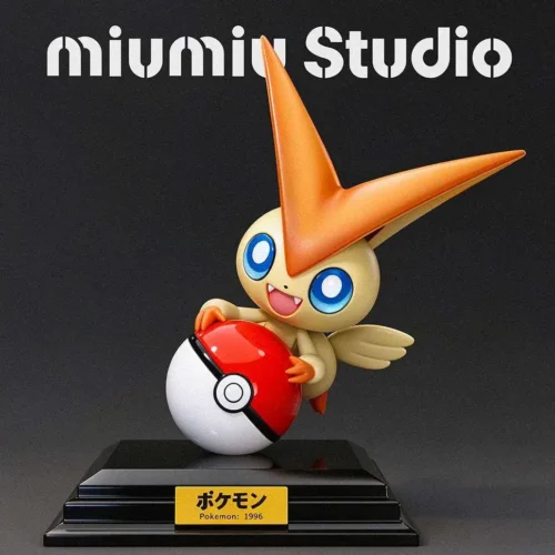Cheerful 1/10 Victini figure by Miumiu Studio embraces an oversized Poké Ball on a glossy black base, limited to 99 pieces.