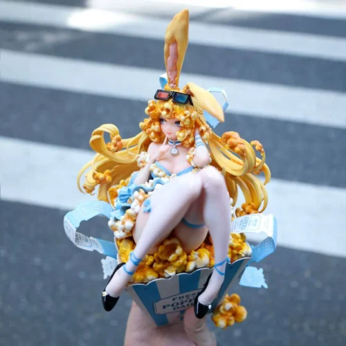 Popcorn Fairies figure with popcorn curls, candy bunny ears, 3D glasses, and retro popcorn bucket base, hand-sculpted PU resin limited to 499 units.