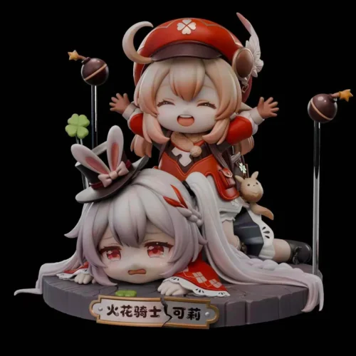 Cheering chibi Klee Genshin figure with giant sleepy head base, bombs and clover accents, showcasing playful resin statue details.