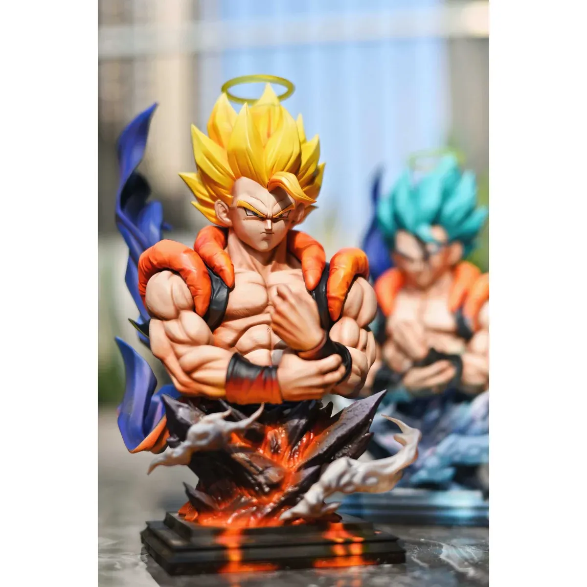 This limited dual Super Saiyan Gogeta bust statue by FXW FER Studio features crossed arms, a halo, fiery base, and icy blue aura.