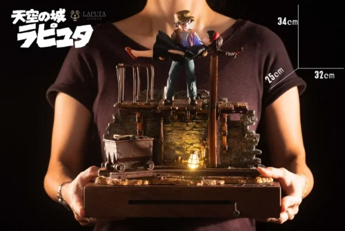 "Laputa Sheeta Pazu Ghibli music box figure with LED lights and sound, on an intricate steampunk base. Limited edition Castle in the Sky statue."