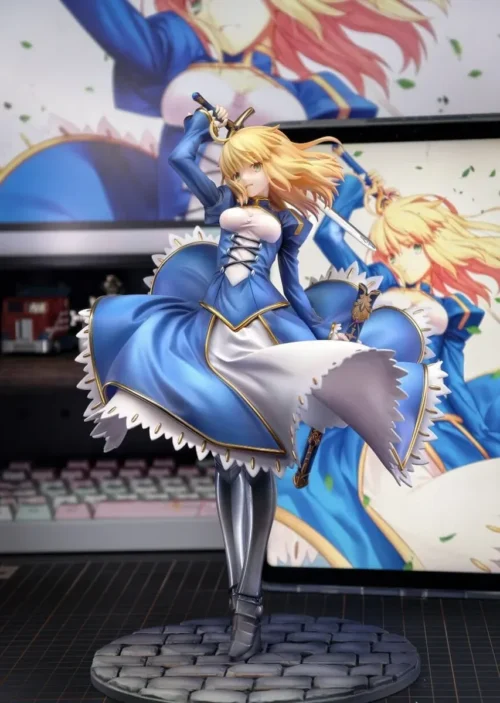 "Limited Edition FGO Saber 1/7 scale statue. Exquisite detail showcases her majestic pose, flowing attire, and intricate base. A premium collectible."