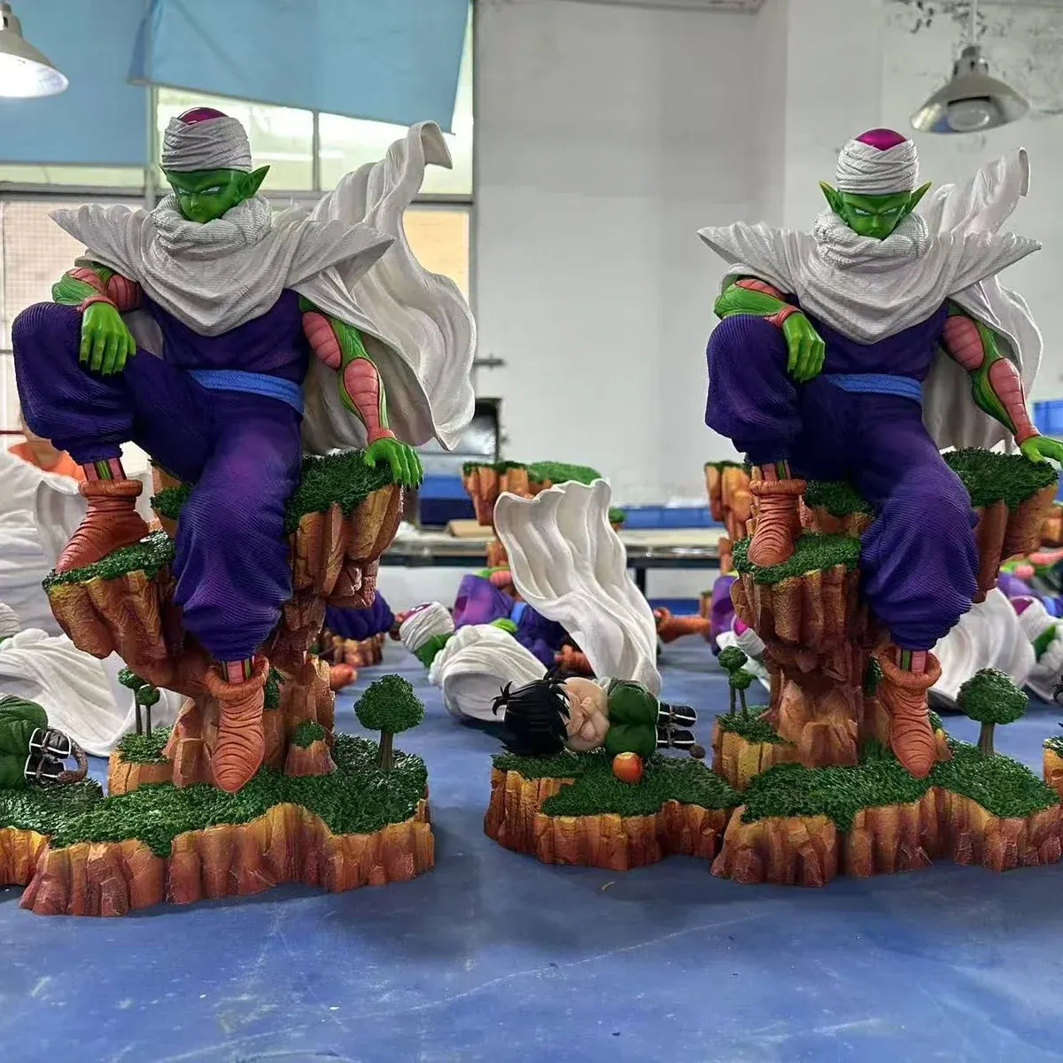 "Dynamic Piccolo Dragon Ball figure in intense meditation pose. See intricate details of his iconic training scene recreation from various premium."