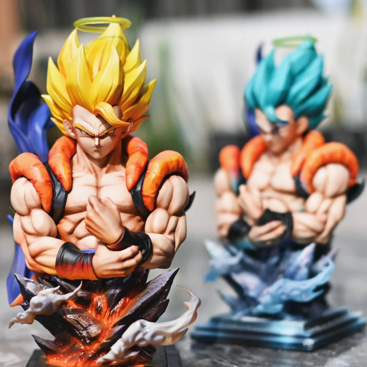 Dragon Ball Gogeta bust statue in limited dual Super Saiyan form, with fiery and icy auras, halos, crossed arms, and detailed sculpting.